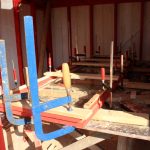 putting together window frame for cabin